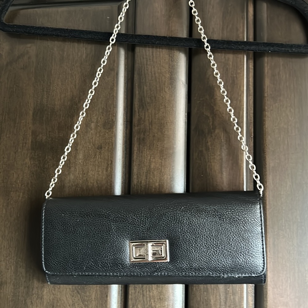 Also baguette style clutch bag with silver chain